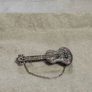 Vintage Silver Tone Guitar Brooch Pin with chain.